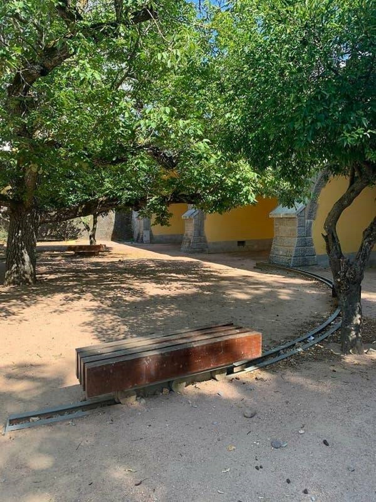 This park has its benches on rails so you can always find shade: