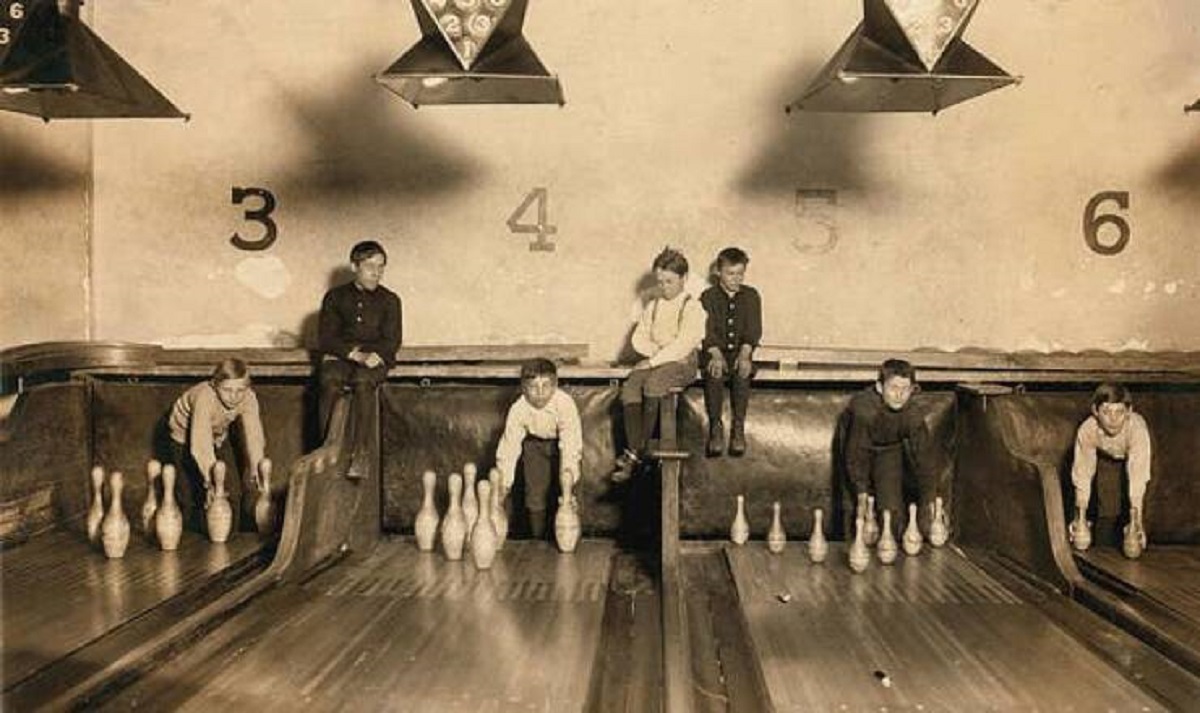 Before the pin-setting machine was invented, bowling alleys would have teens and children set up bowling pins after each frame: