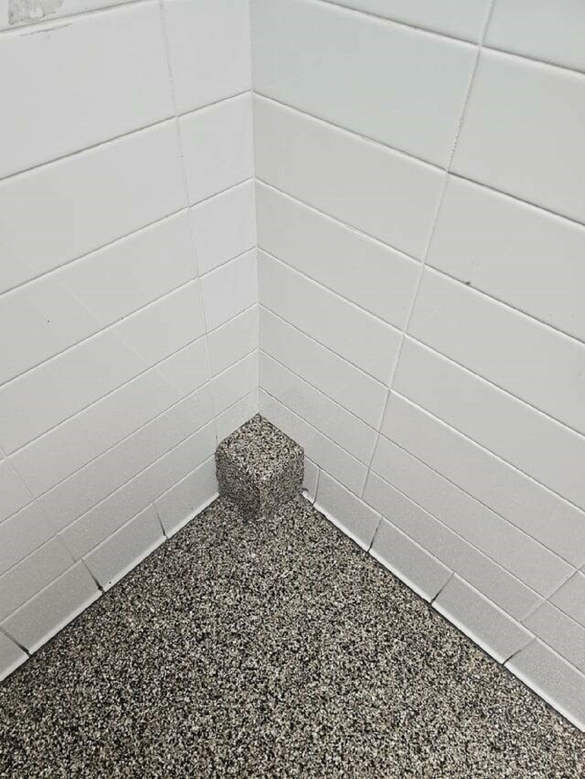 "This bathroom has a random jut in a corner"
