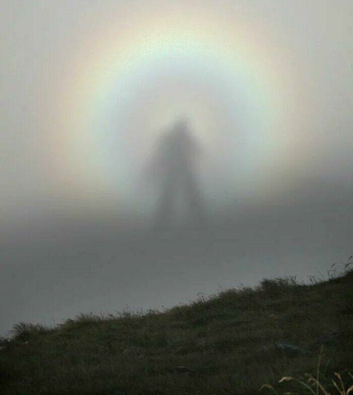 "A Rare Optic Sight, The "Brocken Spectre" Occurs When A Person Stands At A Higher Altitude In The Mountains And Sees His Shadow Cast On A Cloud At A Lower Altitude"