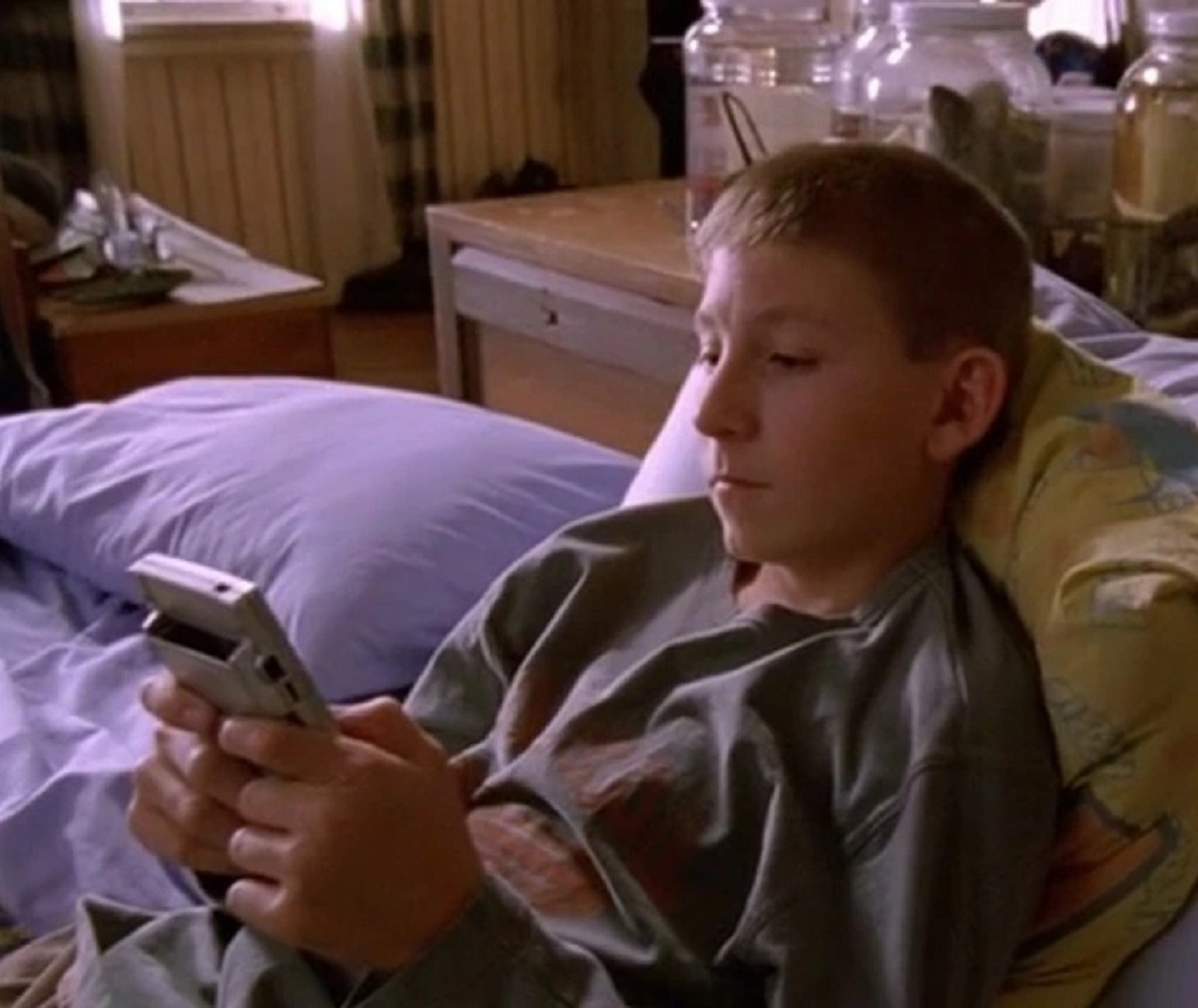 In Malcolm in the Middle, season 7, Dewey plays without a cartridge in his Gameboy.