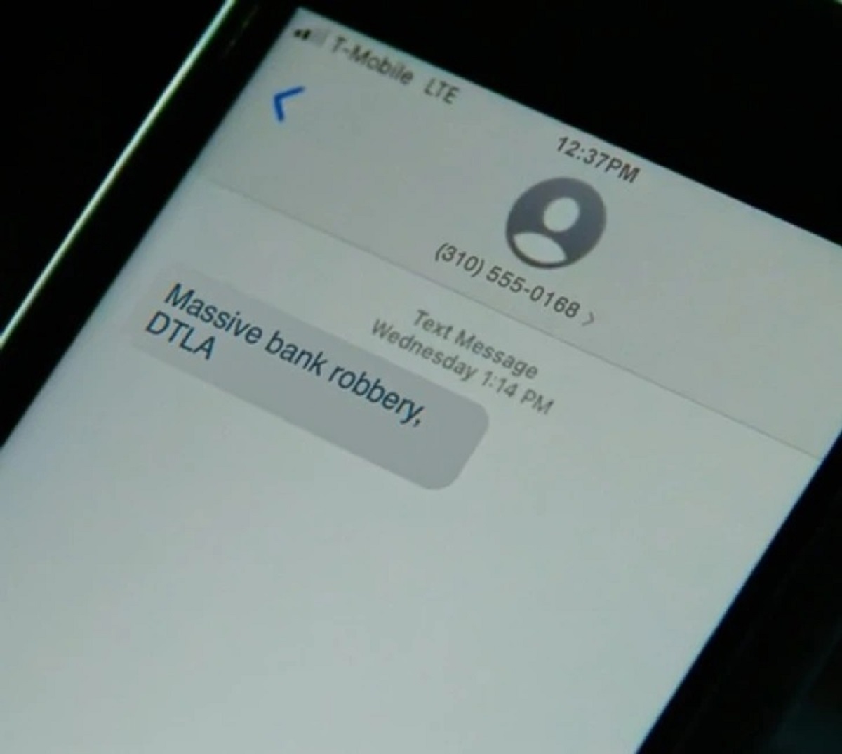 In Ambulance, FBI Agent Anson Clark receives a text message at 1:14 p.m. despite his phone time reading 12:37 p.m.