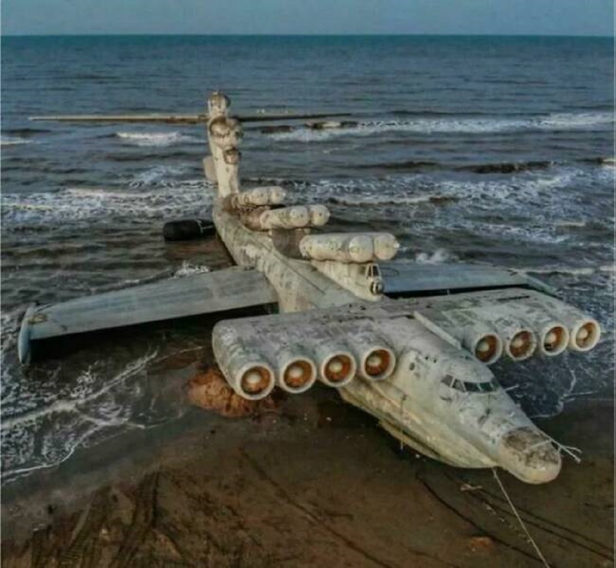 "Lun-Class Ekranoplan Abandoned On A Beach. This Is Not Classified As Aircraft Because It Used The Ground Effect To Travel Just Feet Above The Water. They Haven't Been In Use Since The 90s"