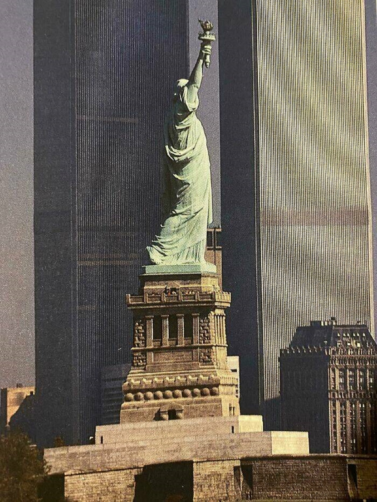 "Photo I Found In A Book From 1987 Of The Statue Of Liberty With The Twin Towers Behind It. There Are Actually People Visible Just Below The Statue, To Make The Photo Even Worse"