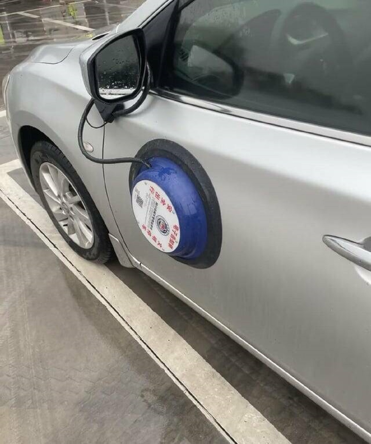 "This device they put on your car if you don’t park inside the line"