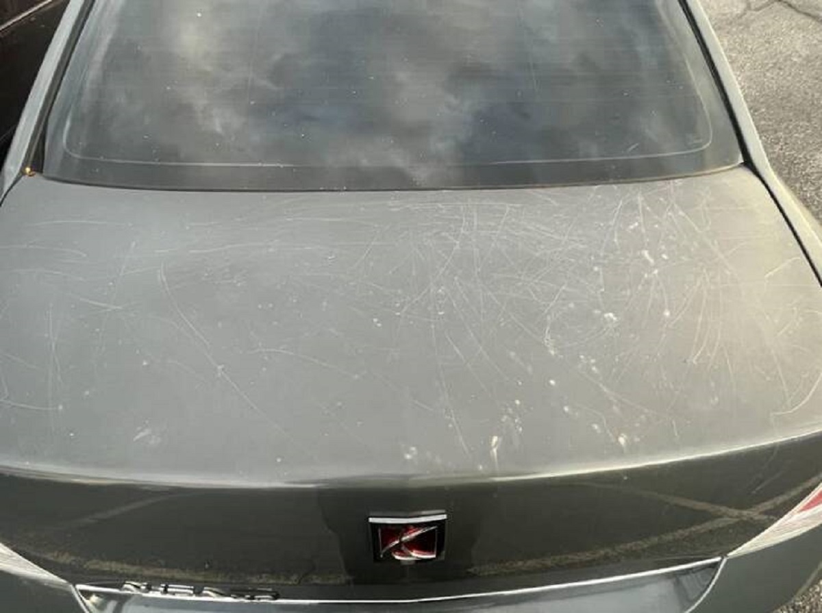 This person woke up to allll these scratches on car:
