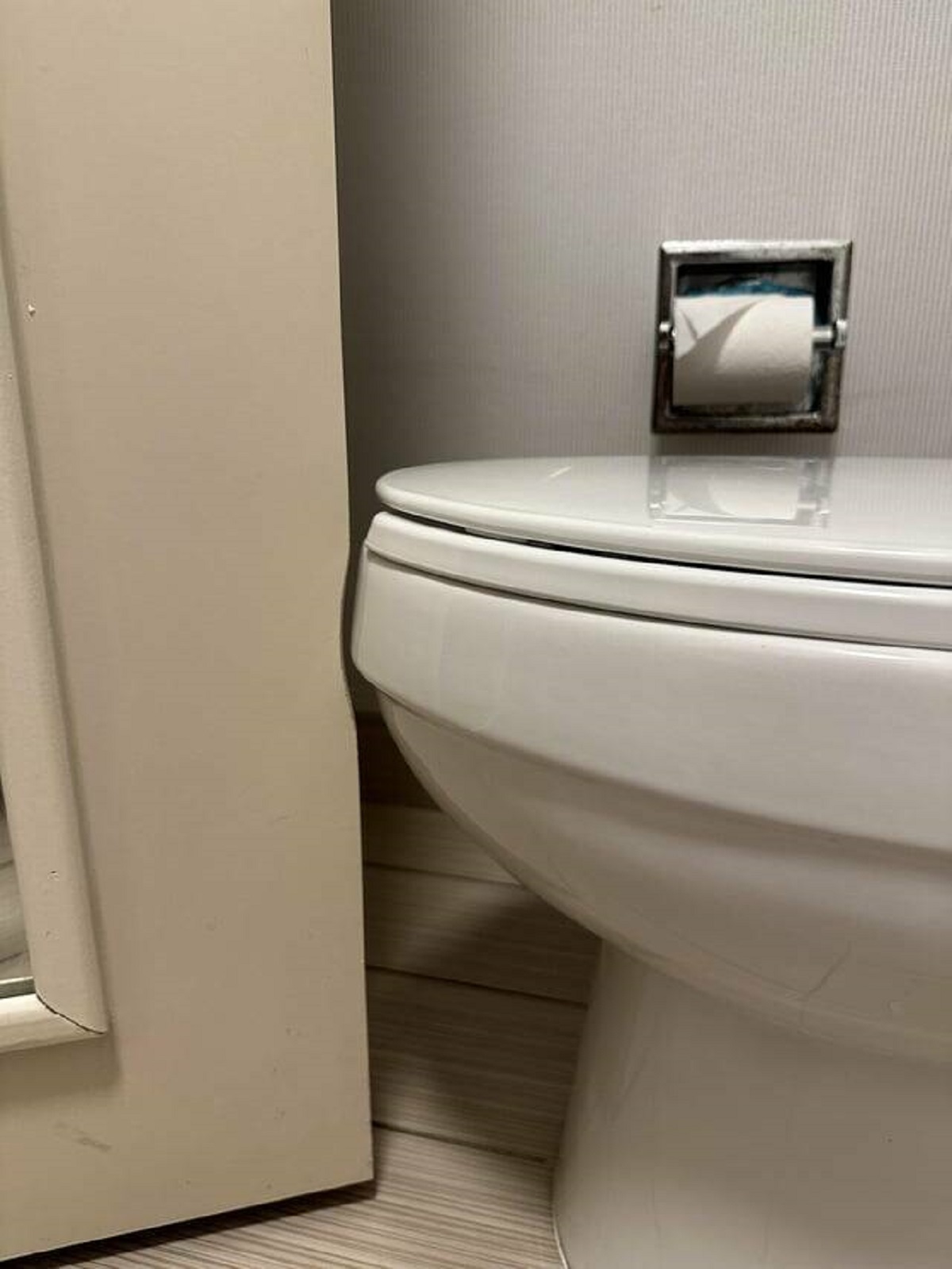 "My hotel sanded the door after realizing it hit the toilet"