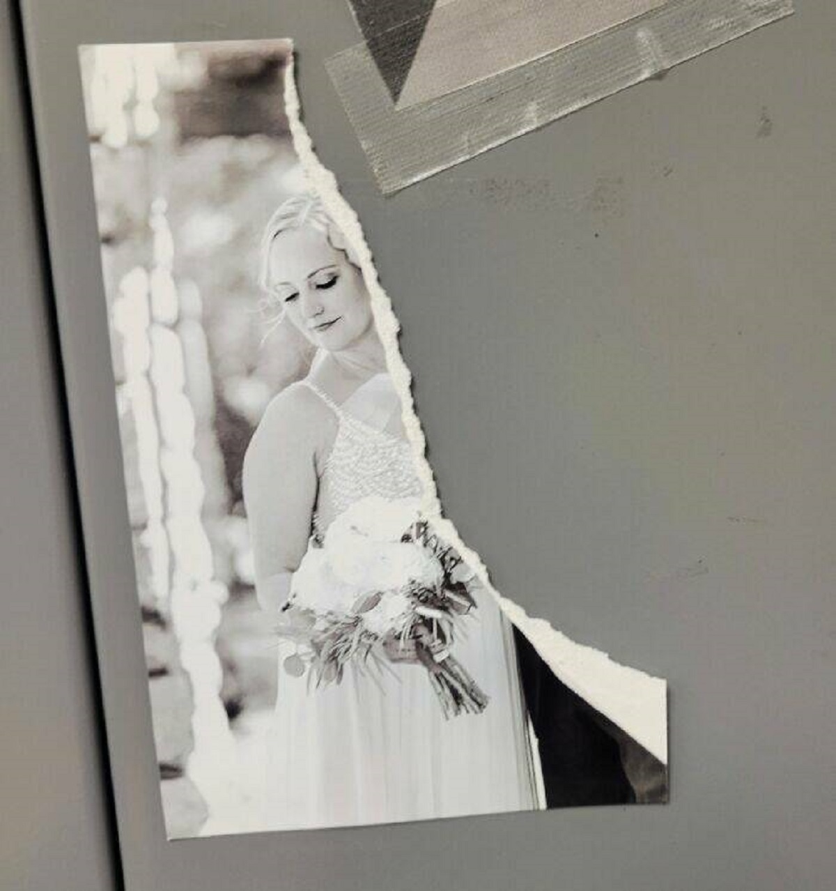 "Someone At Work Perfectly-Ripped My Husband Out Of The Wedding Photo On My Locker. There's No Way This Was Accidental"