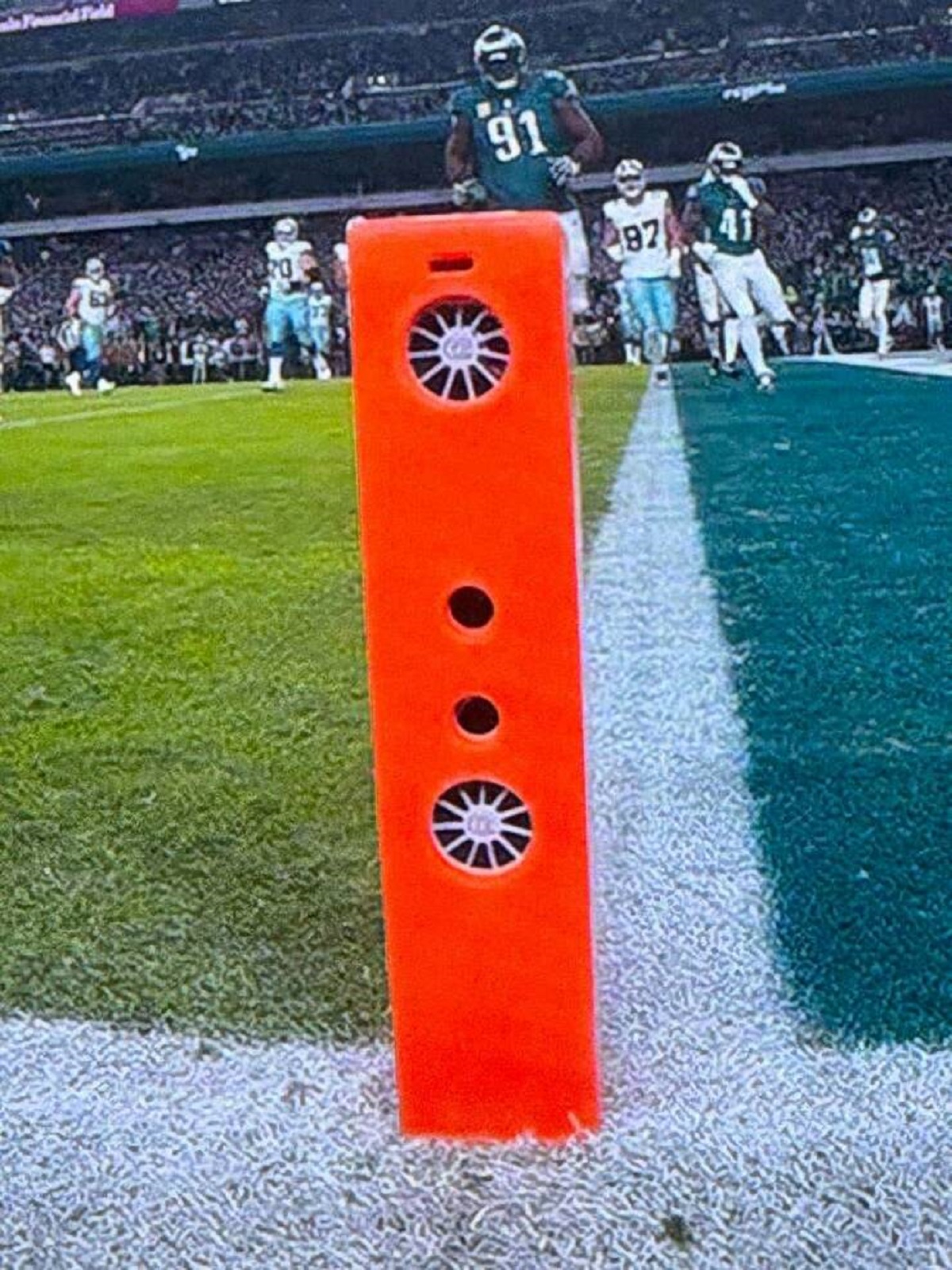 The orange pylons in football end zones have so much technology in them that they require fans to operate.