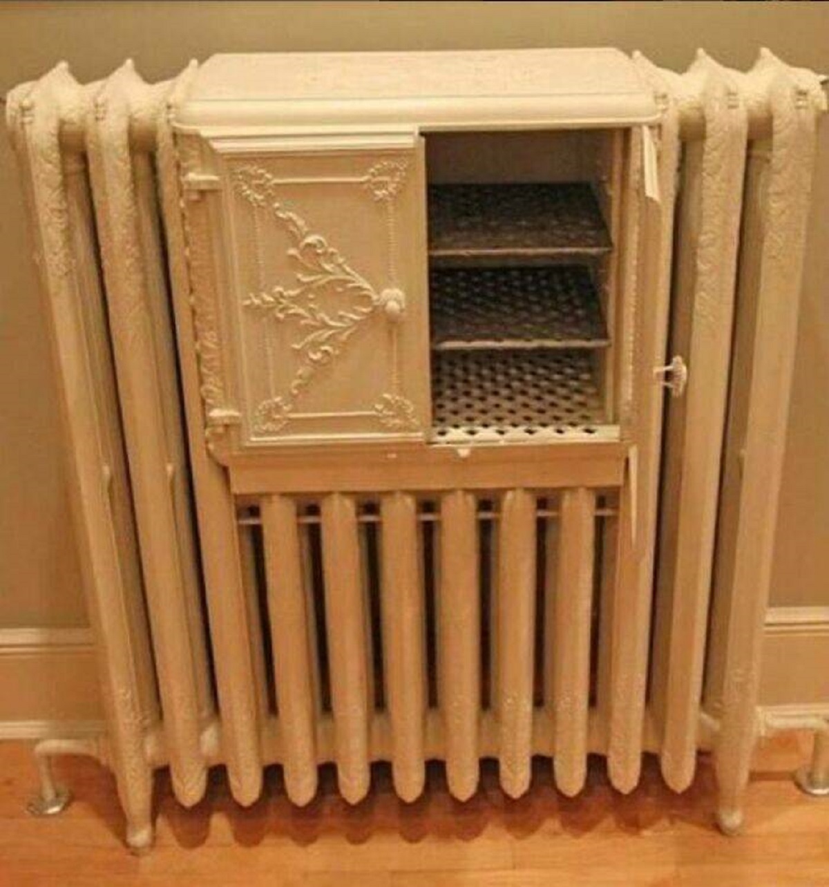 "A Late 19th-Century Victorian Radiator With A Built-In Warming Oven Is A Charming Relic From A Bygone Era"