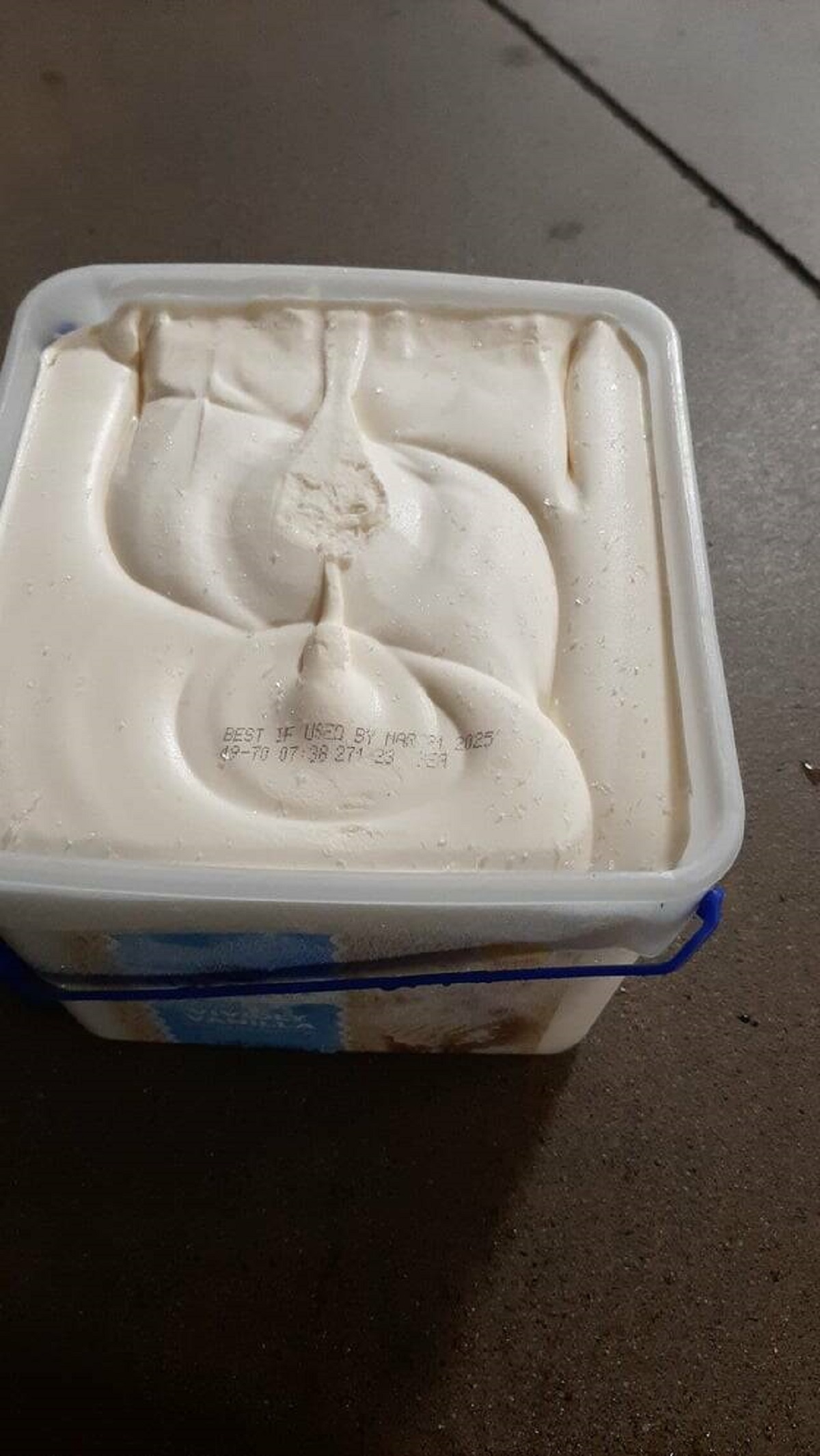 "This ice cream arrived without a lid, and with the best by date stamped right on the ice cream"