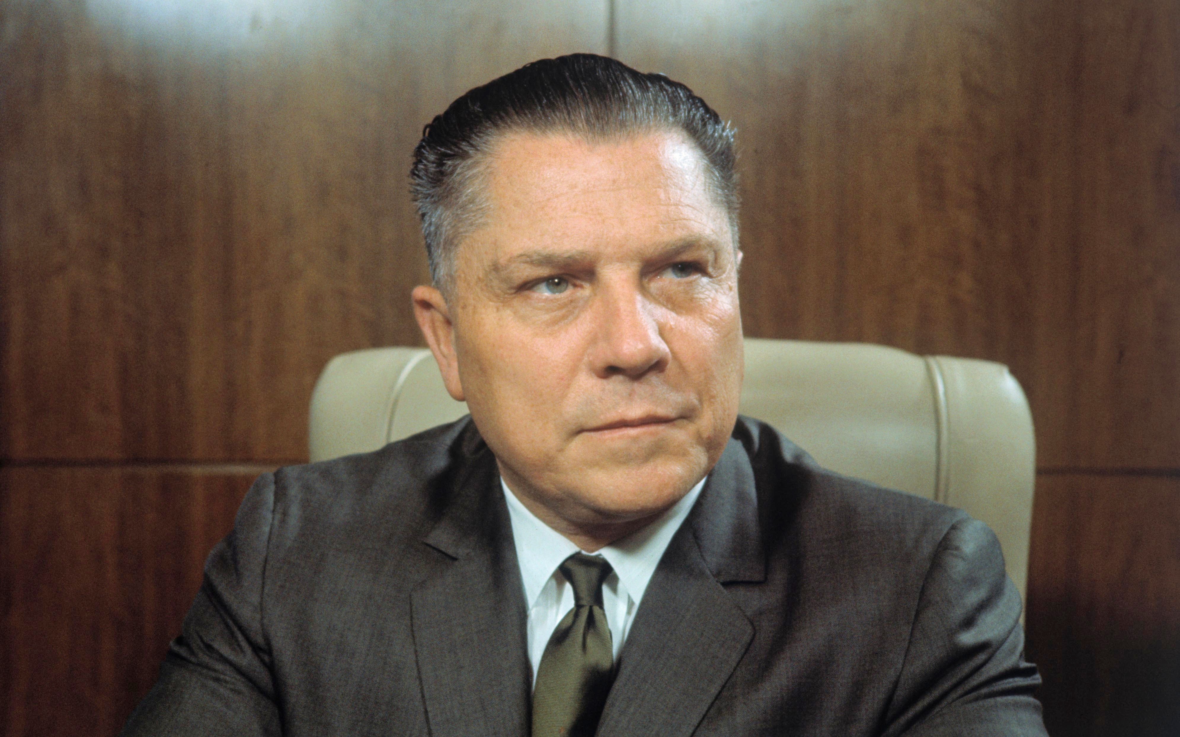 Jimmy Hoffa, a prominent union leader, vanished in 1975 after planning a meeting with Detroit mobsters. Respected by union members but linked to organized crime, his disappearance remains a mystery. Theories, including being buried in Giants Stadium, fuel ongoing speculation about his fate.