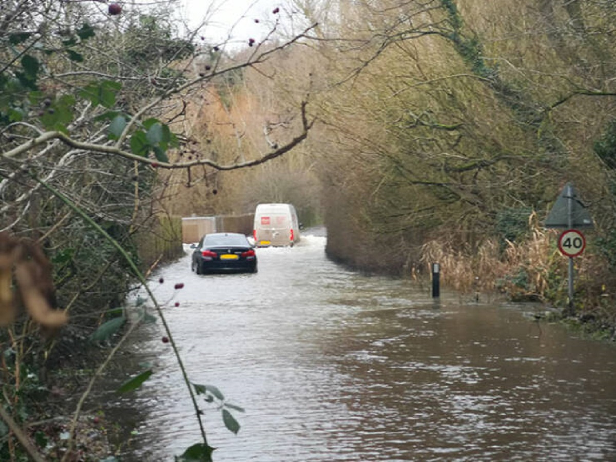 "This Moring, I Walked Down To The Flooded Road In My Village To Warn People About The Flood. I Told The BMW Driver He Wouldn't Get Through, But He Didn't listen"