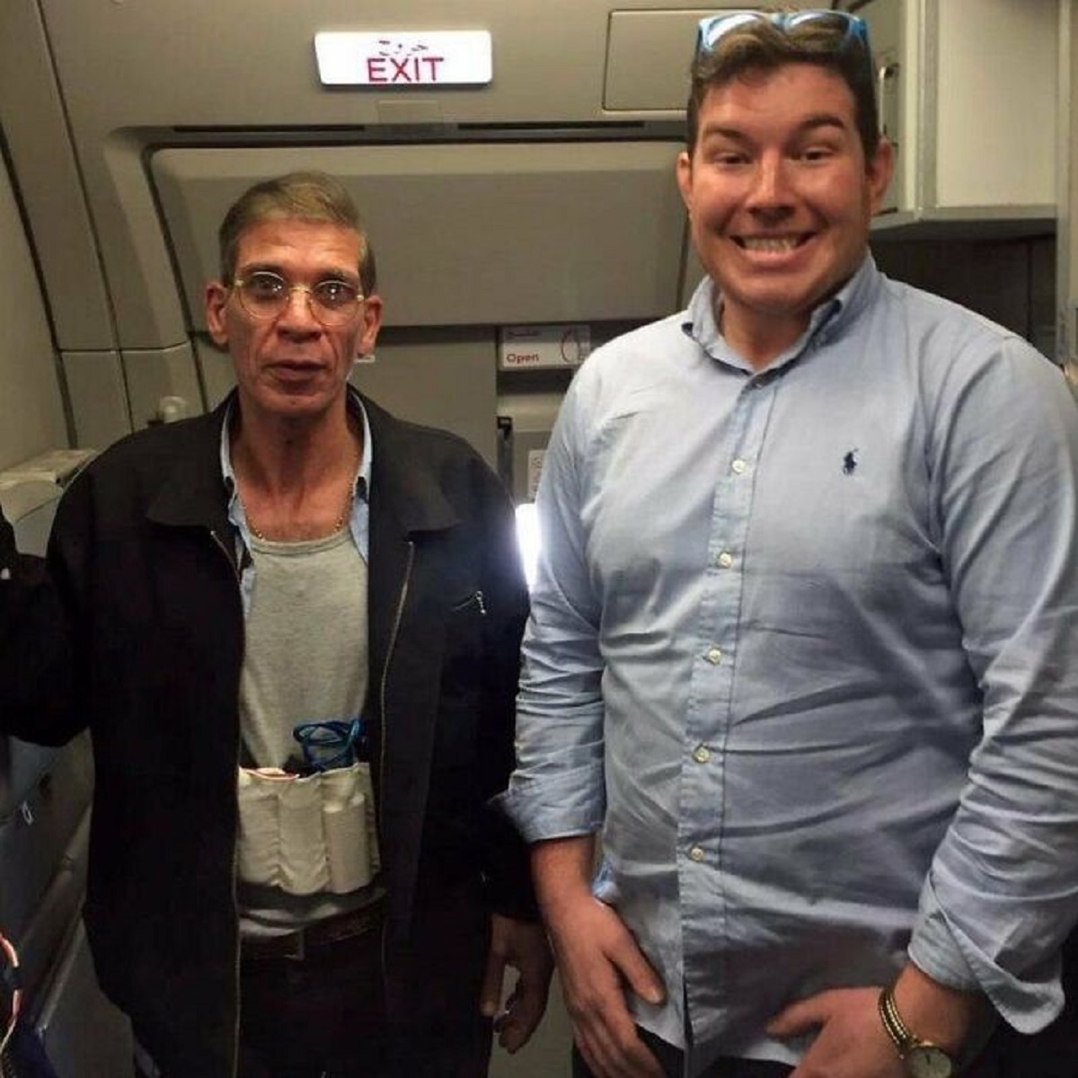 In 2016, a 26-year-man from the U.K., named Ben Innes, was on an EgyptAir flight to Cairo.

During the flight, a passenger named Seif Eldin Mustafa, hijacked the plane, wearing a vest packed with explosives and carrying a detonator.

The hijacker demanded that the pilot land the plane in Cyprus instead of Egypt. The pilot obliged fearing the terrorist would detonate the bomb if he didn’t.

Upon arriving in Cyprus, Seif Eldin released 52 out of the 55 terrified passengers but kept 3 passengers as well as 4 of the plane's crew on board as hostages.

Among these remaining 7 was Ben Innes.

Ben decided to walk up to the hijacker and then ask him if he could take a selfie. Although slightly bewildered, the hijacker allowed him to take the picture.

Thankfully, the bomb turned out to be fake. Seif Eldin was arrested and the remaining 7 people on board were freed.

When questioned about why he took the photo, Ben explained that he was attempting to remain optimistic. He reasoned that if the bomb turned out to be real, he felt he would have nothing to lose anyway.