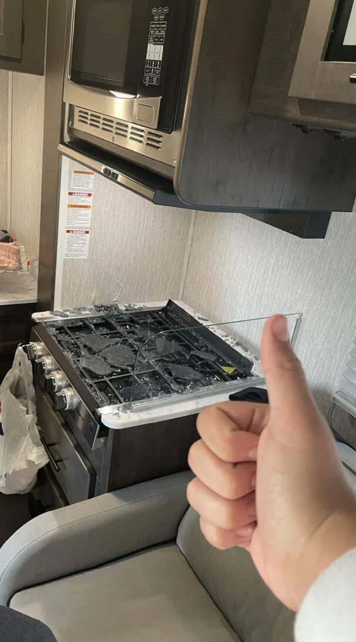 This person who forgot to take the glass off the stove before cooking in a rented RV: