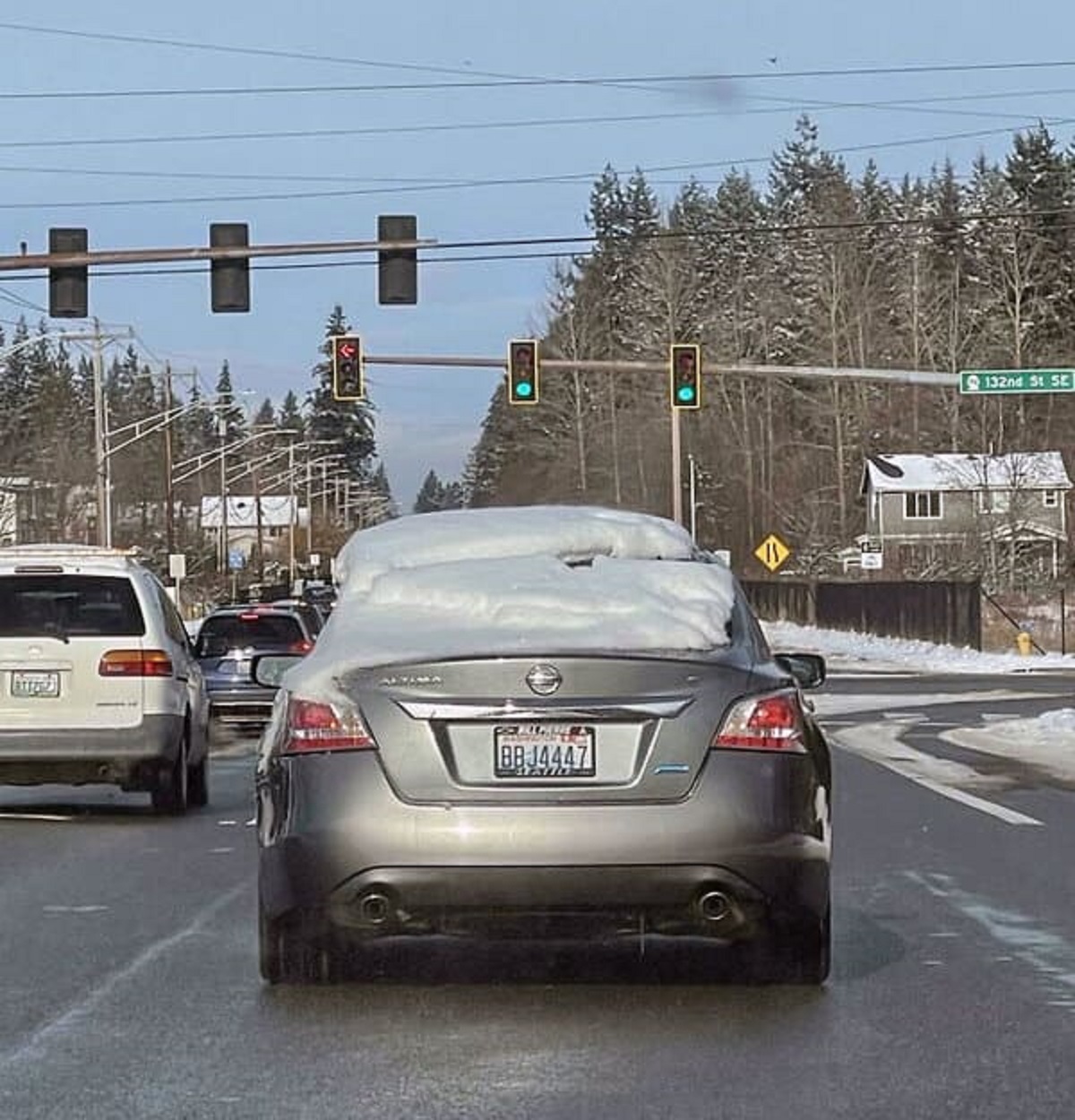 Left His Driveway But Didn’t Clear The Rear Window Of Snow. Lazy. Dangerous