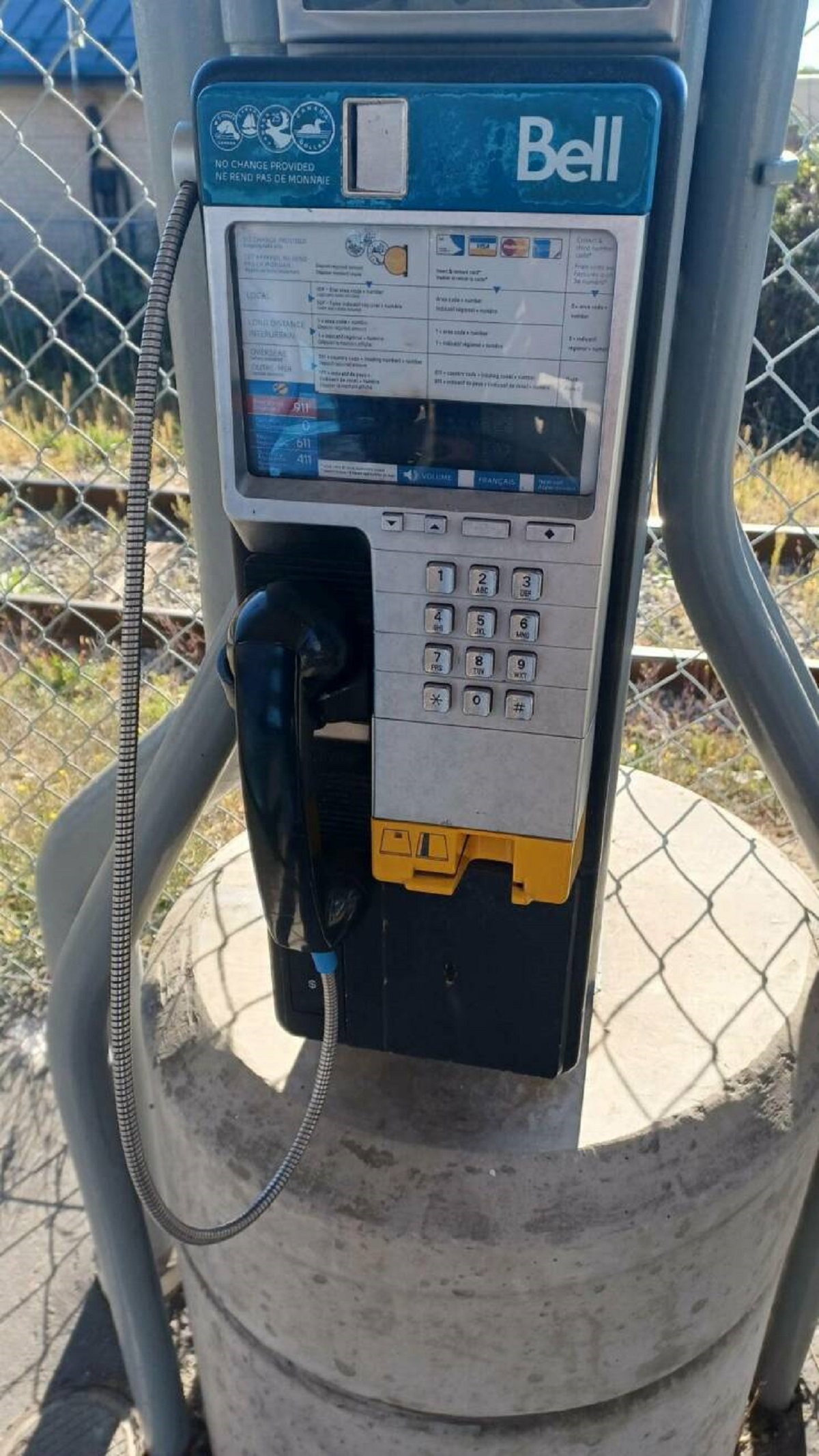 Pay phones still exist...and they take cards: