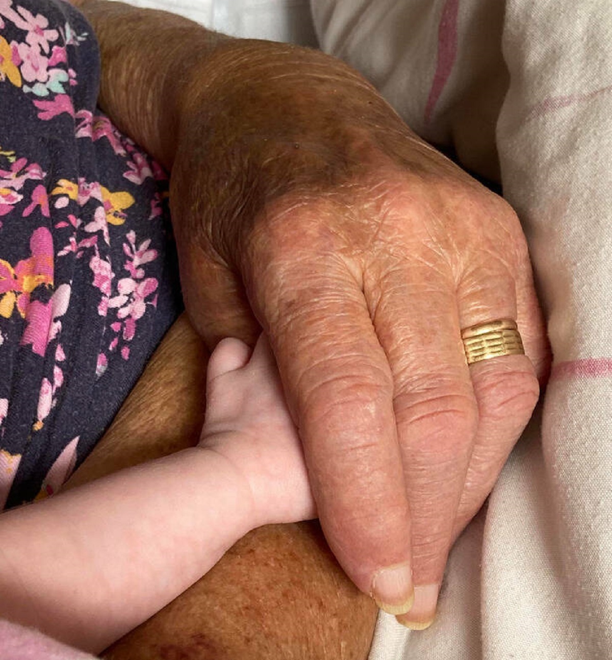 “My newborn held hands with her great-grandmother (91) and they both fell asleep”