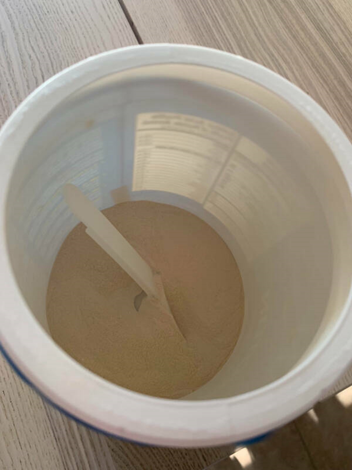 “I just opened this protein powder and this is how much was inside. What a joke. I could get probably 4 scoops out of this.”
