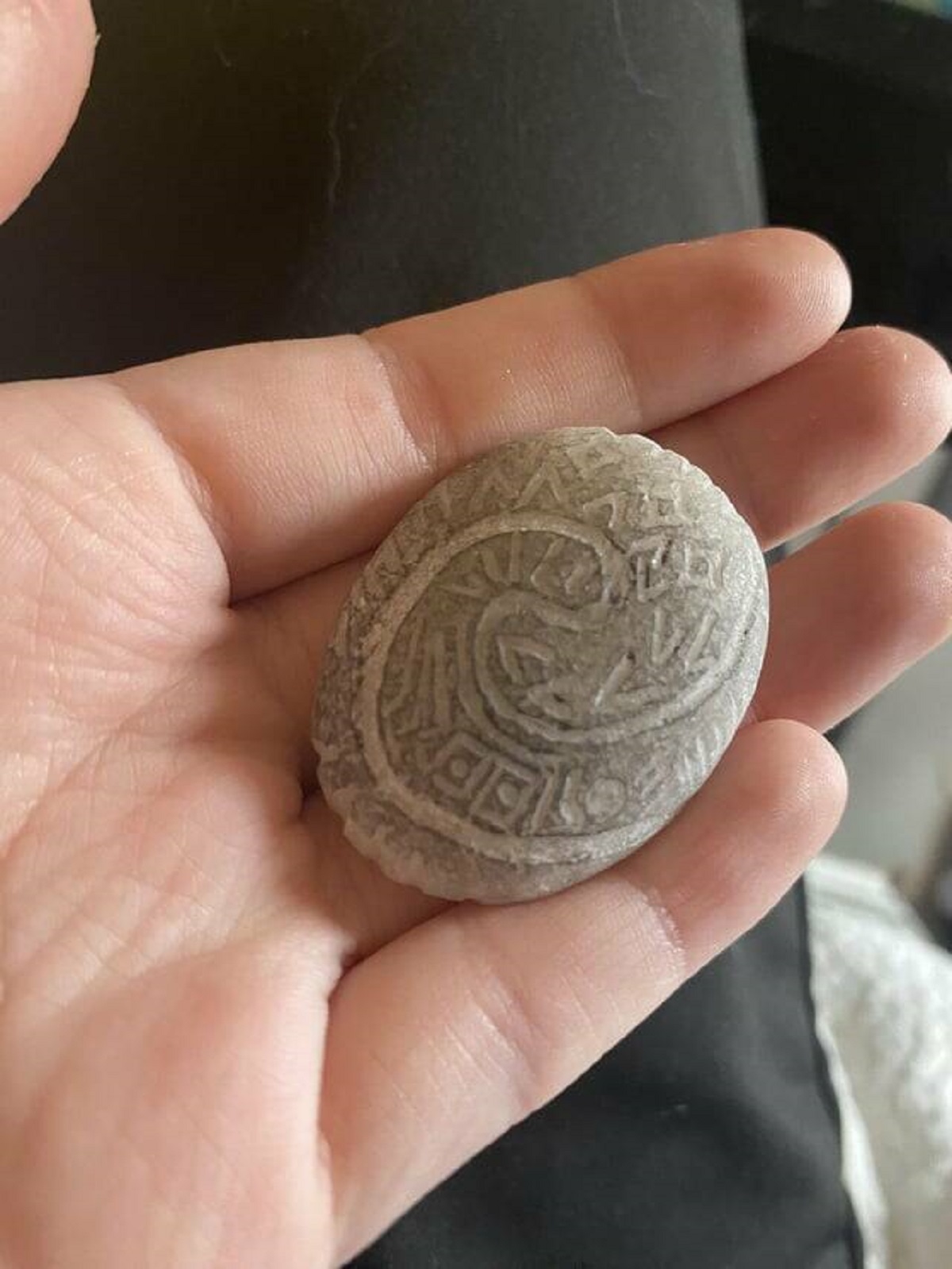 "Found this mysterious carved rock on the ground on my walk home from work the other day"