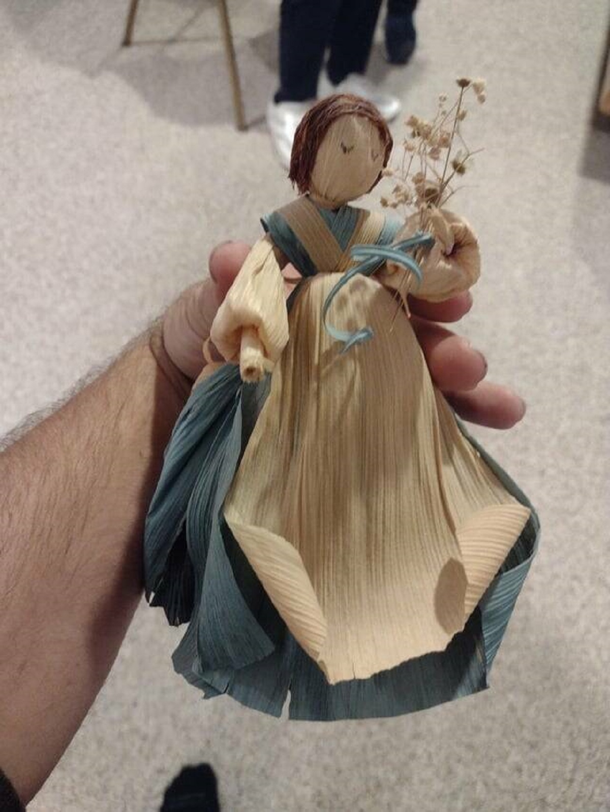 "A doll my grandmother made from corn husks and corn silk when she was young."