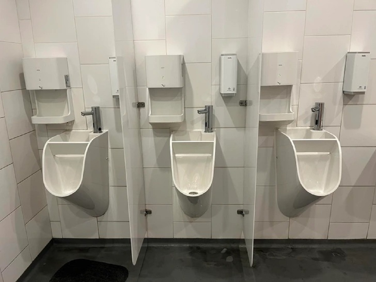 “Combined urinal/sinks — the used sink water drains into the urinal.”