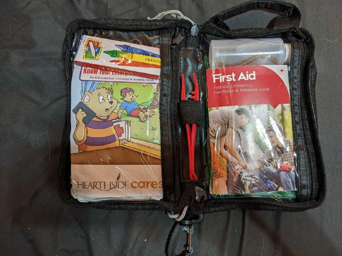This Is Our “Employee Appreciation” Gift. A First Aid Kit, Complete With A Children’s Activity Book, And Crayons. I Work At A Factory
