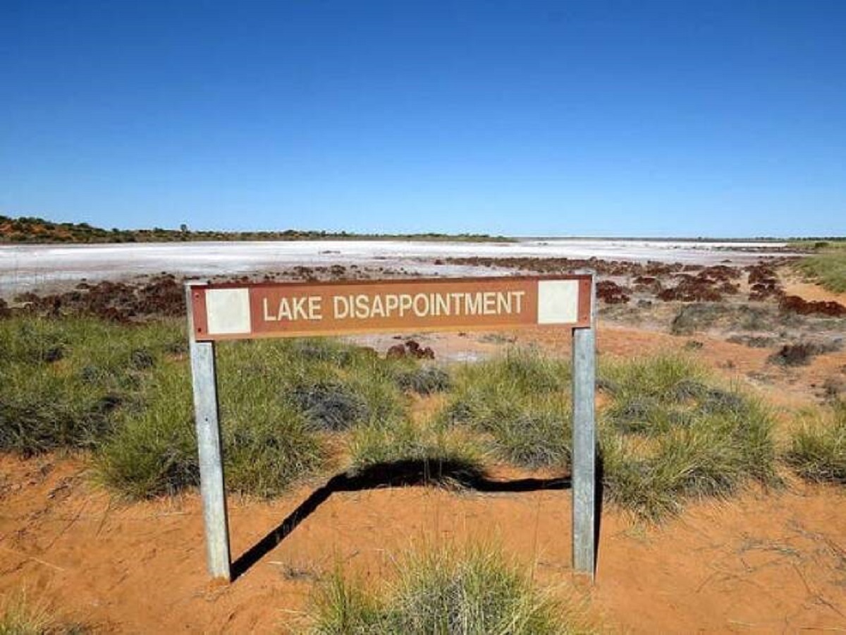 There was a lake in Australia named Lake Disappointment:

It was called that because the person who "discovered" it was disappointed at how small it was. It's now known as Kumpupintil Lake, which is much nicer.