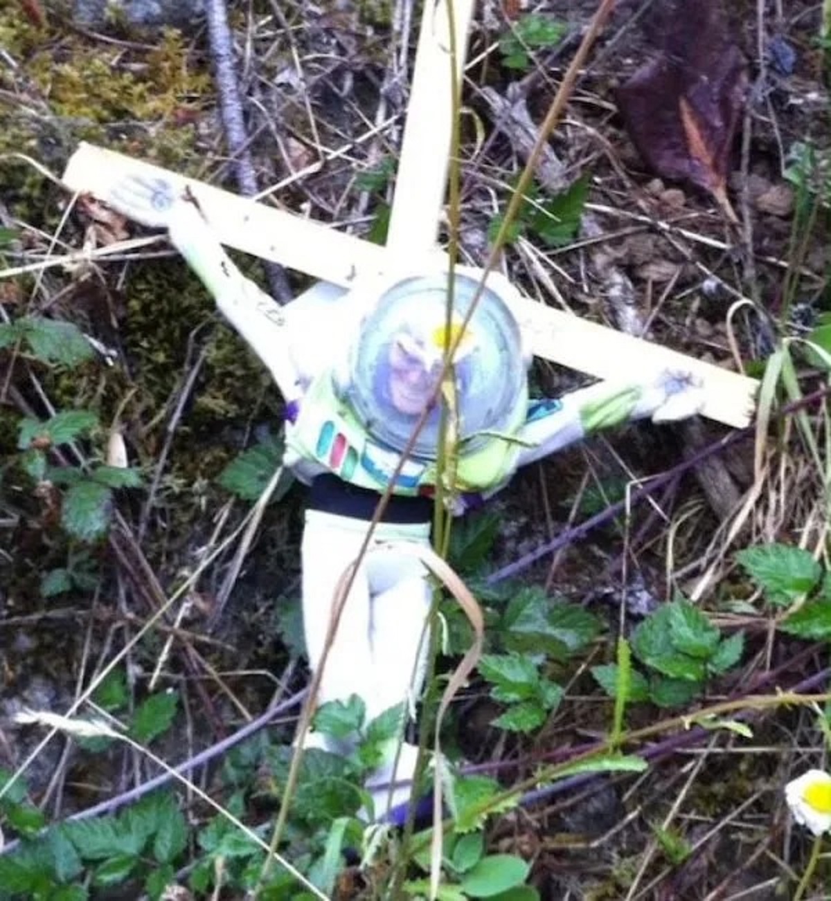 buzz lightyear on a cross