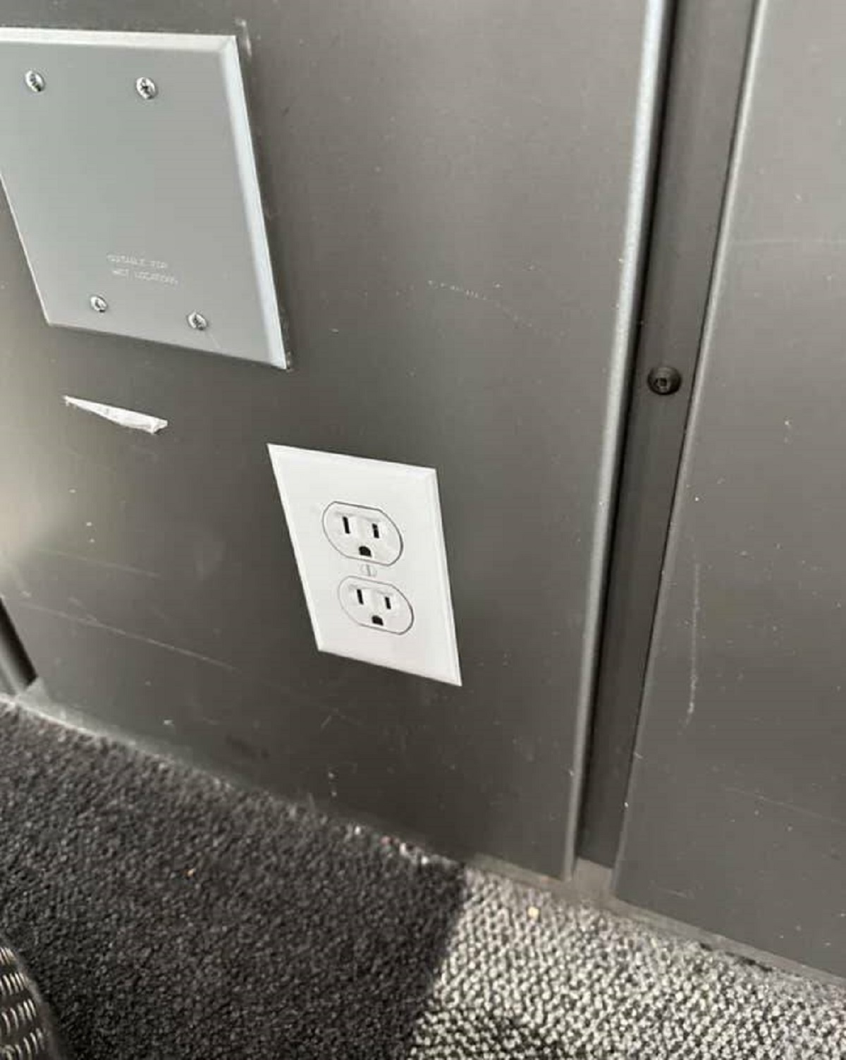 "Trying to charge my phone at Austin airport, and there’s a sticker of an outlet."