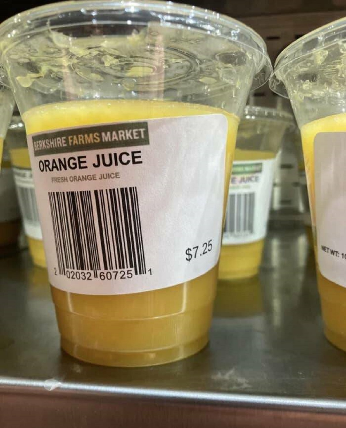 "This cup of orange juice at a Boston airport that costs federal minimum wage."