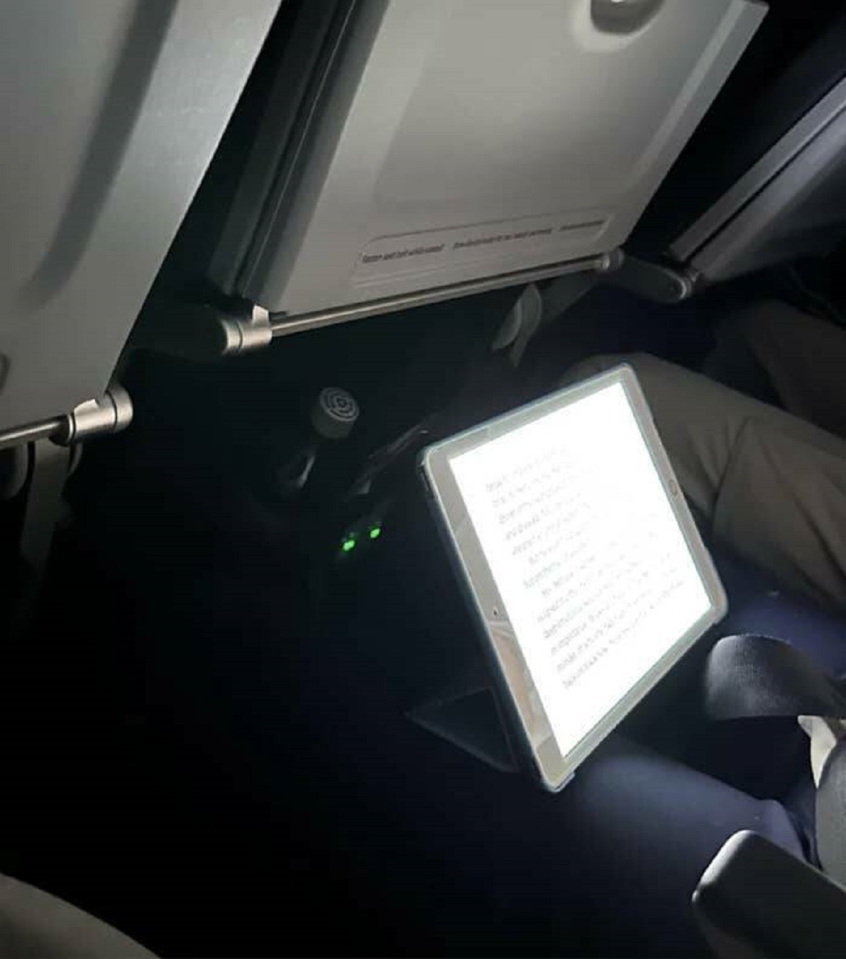 "This person reading on their iPad with the brightness all the way up on a six-hour red eye flight."