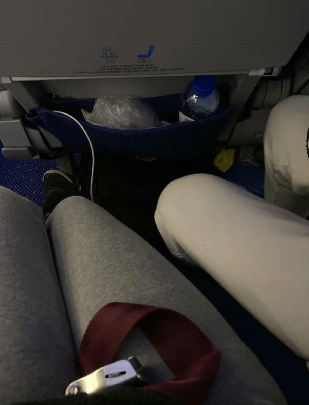 "What I had to deal with on an 11-hour flight yesterday (I’m the gray sweatpants)."