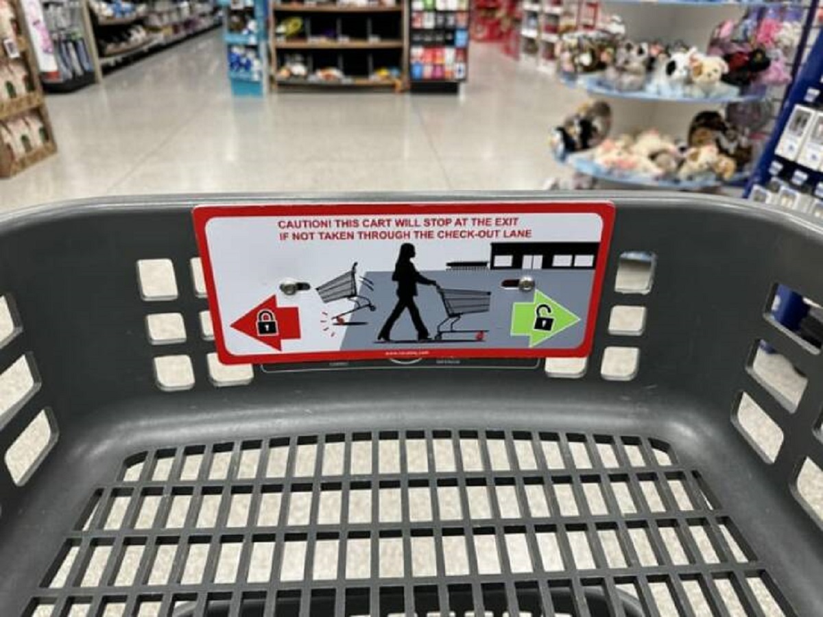 Caution! This Cart Will Stop At The Exit If Not Taken Through The CheckOut Lane