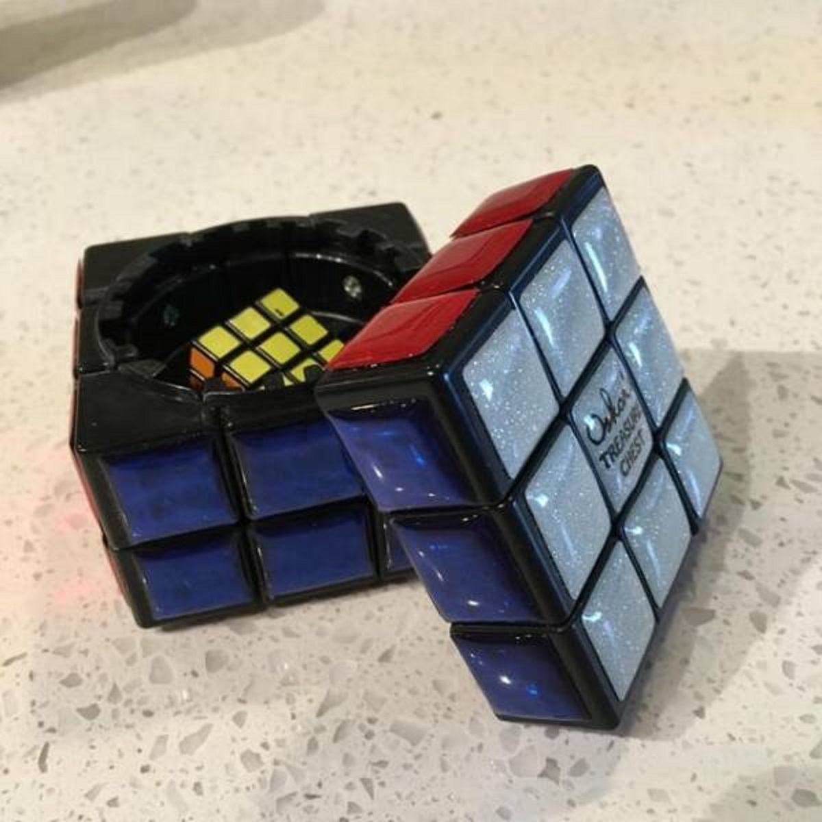 "A Rubik's Cube that doubles as a treasure chest. It only opens when solved."