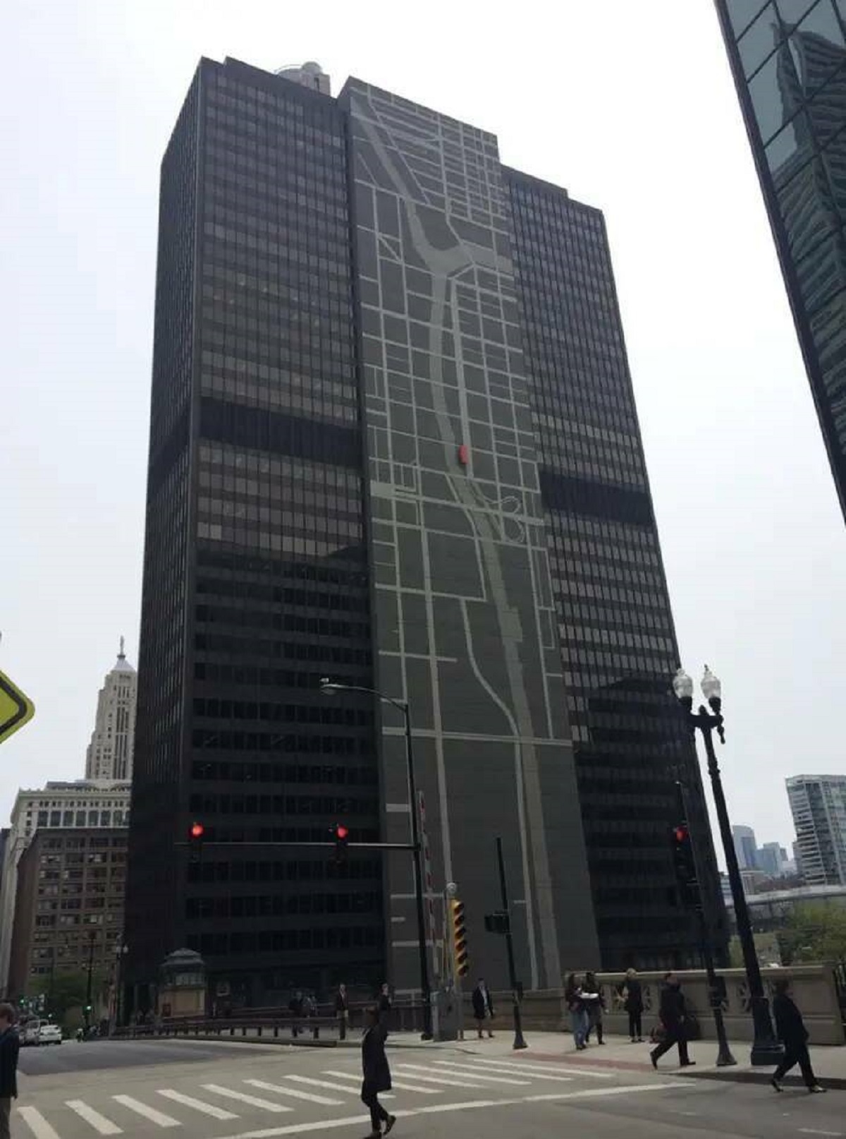 This skyscraper in Chicago shows a map of the city, including where you are.