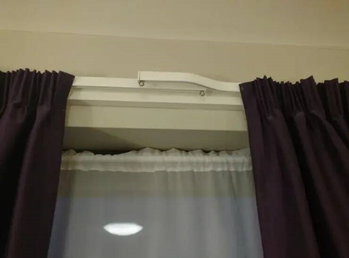 And also, why every curtain rod isn't designed like this. That little sliver of light between curtains kills me every single morning.