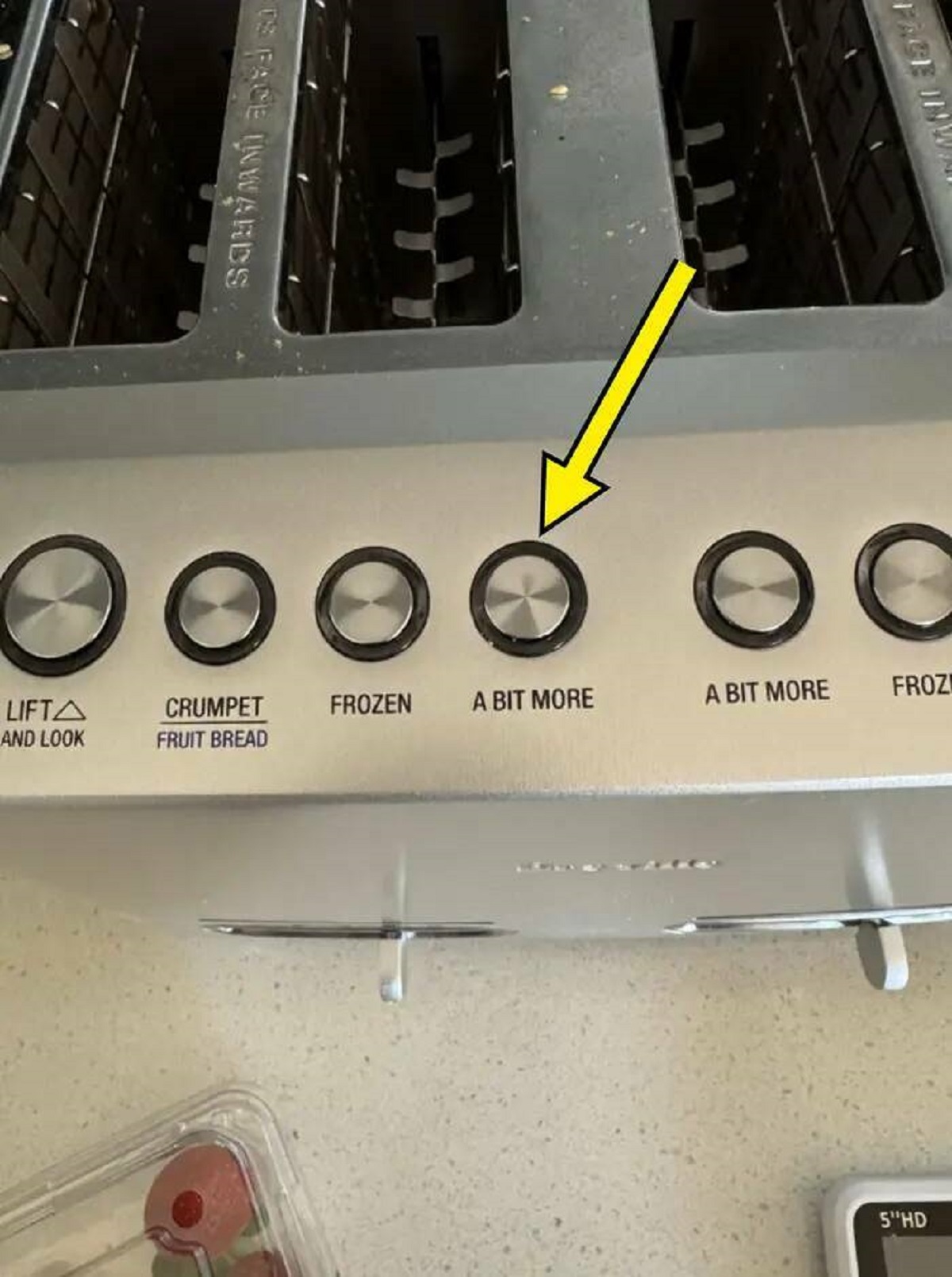 I would like to shake the hand of the person who added this "a bit more" button to a toaster, because it is exactly what I need every single time.