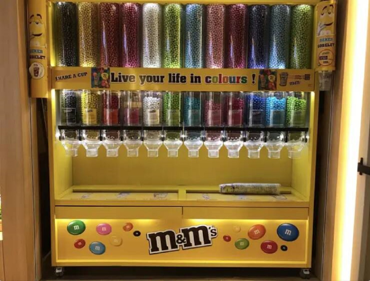 This M&M machine should be in every movie theater, because I would specifically like only blue M&Ms, thank you very much.