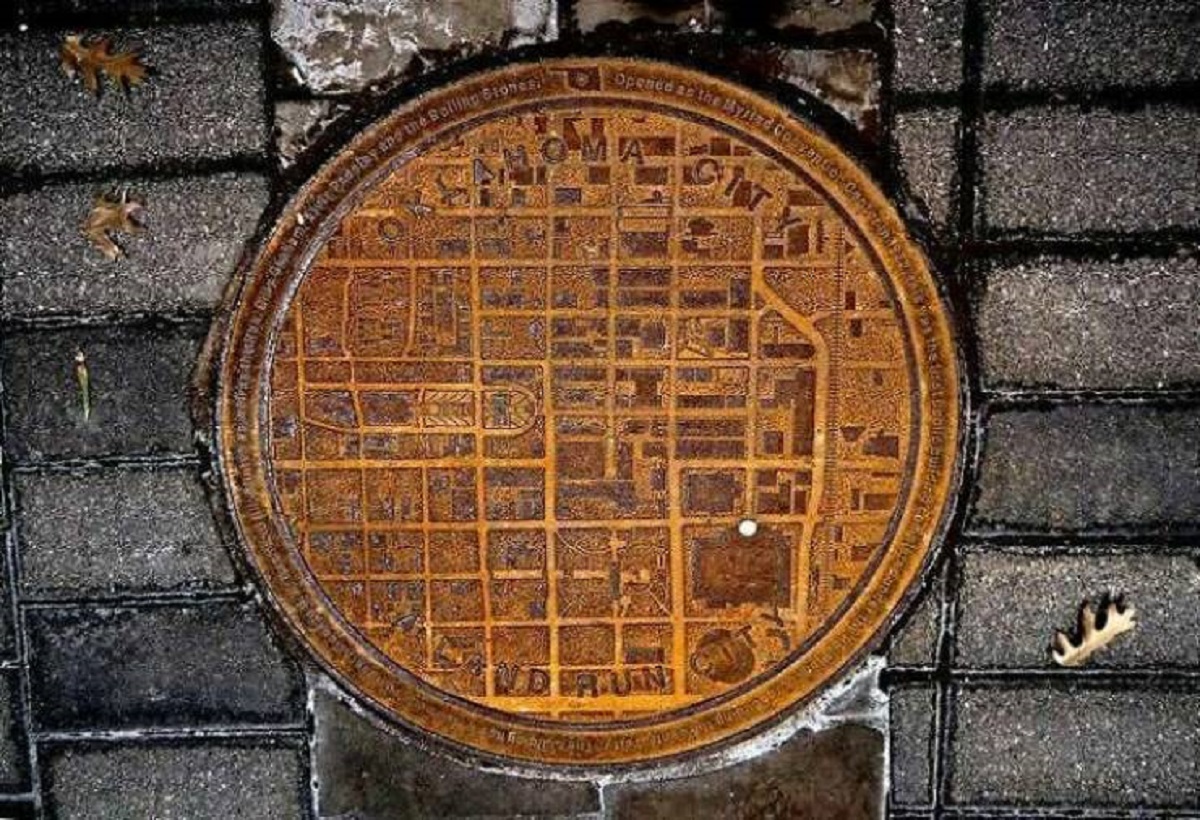 "This Is Exactly What Makes Good Design! Oklahoma Manhole Covers Have A City Map On It With A White Dot Showing Where In The City You Are"