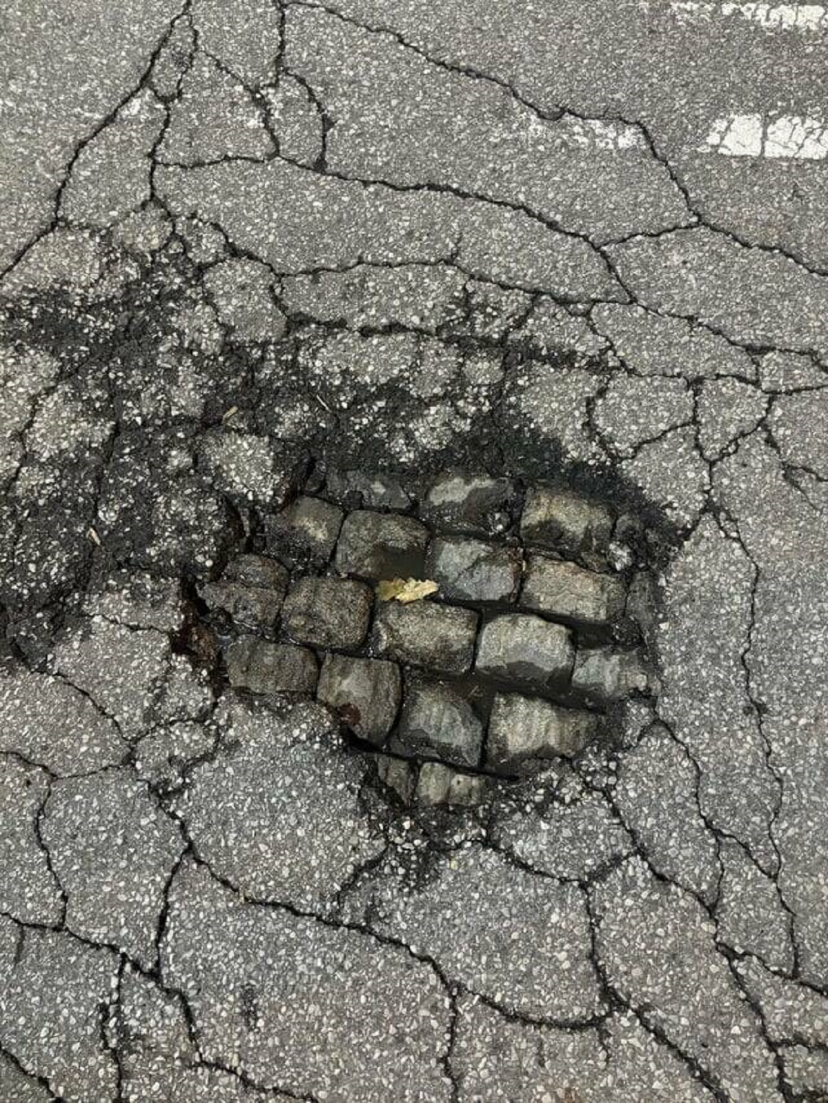 "In downtown Cincinnati, all the roads used to be cobbled instead of asphalt and apparently they never tore it up"