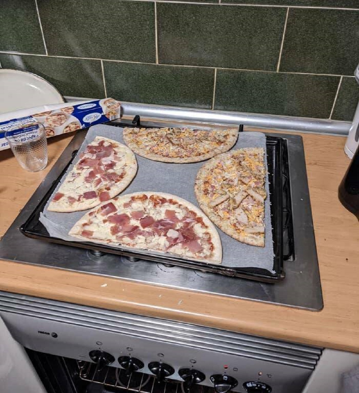 "Can't fit two pizzas in your small oven? Cut them in half for optimal pizza placement."