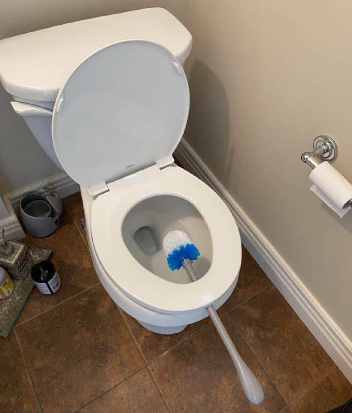 "A simple and effective way to dry your toilet brush."