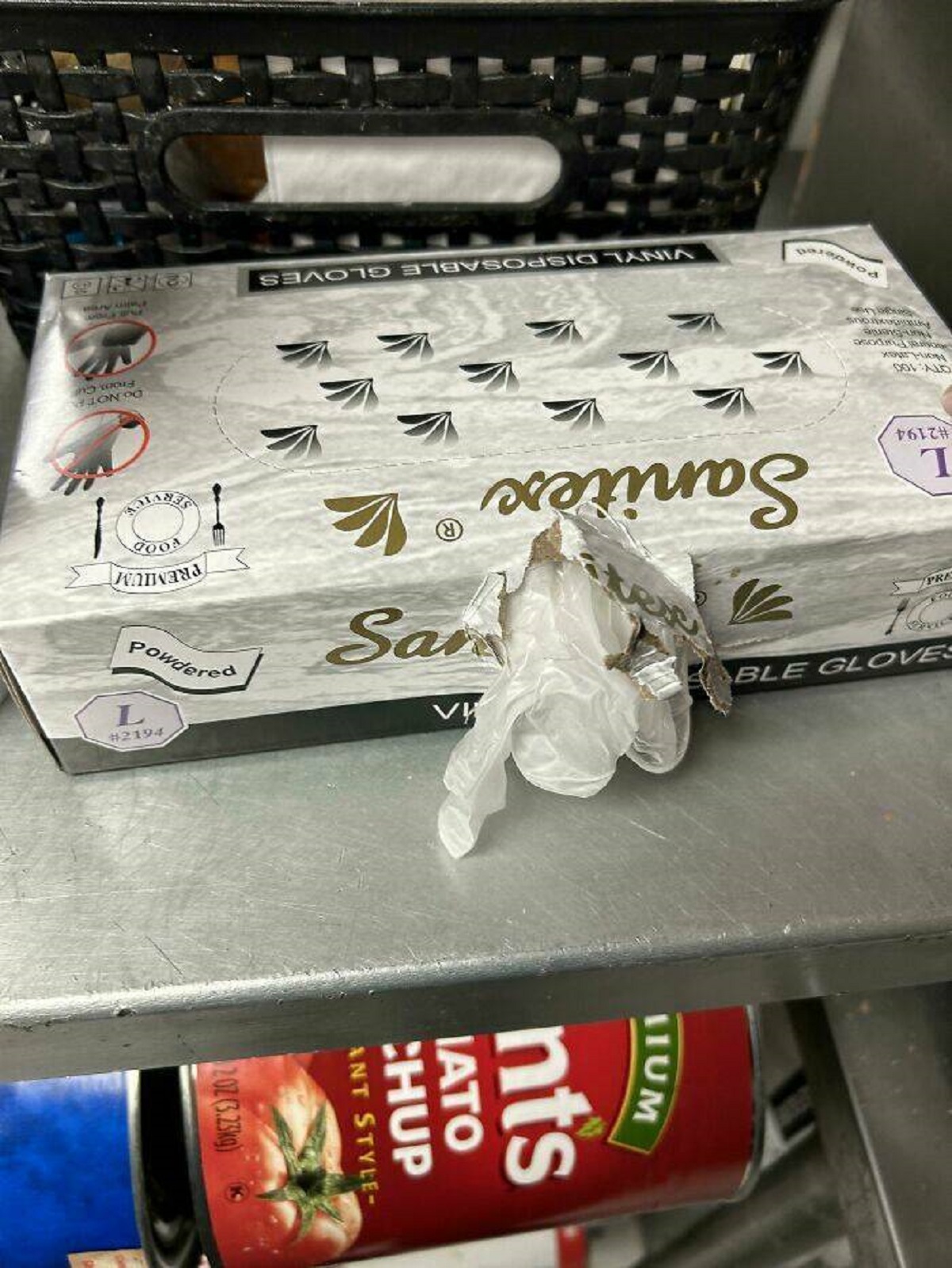 "How My Coworker Opens A Box Of Gloves With A Perforated Top"