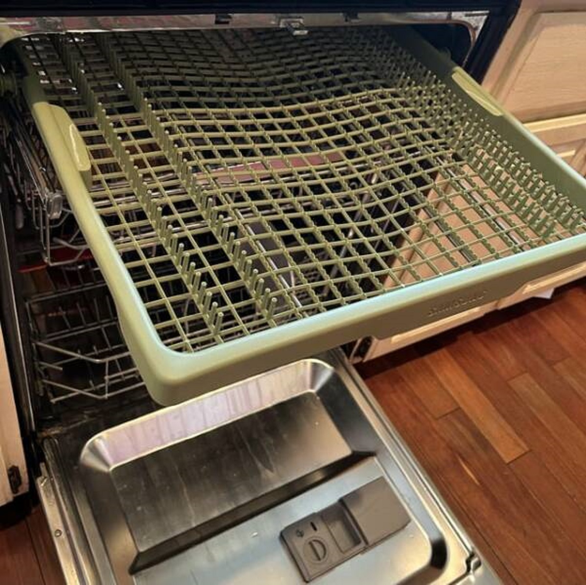 "Samsung dishwasher rack turned green overnight"
