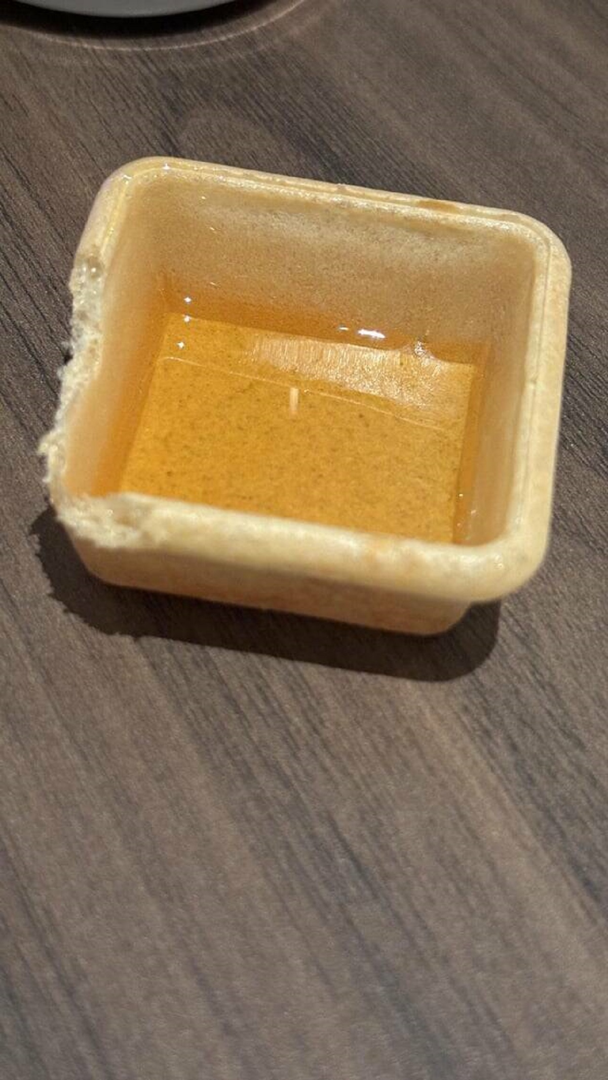 "This honey container from my hotel breakfast buffet is edible"