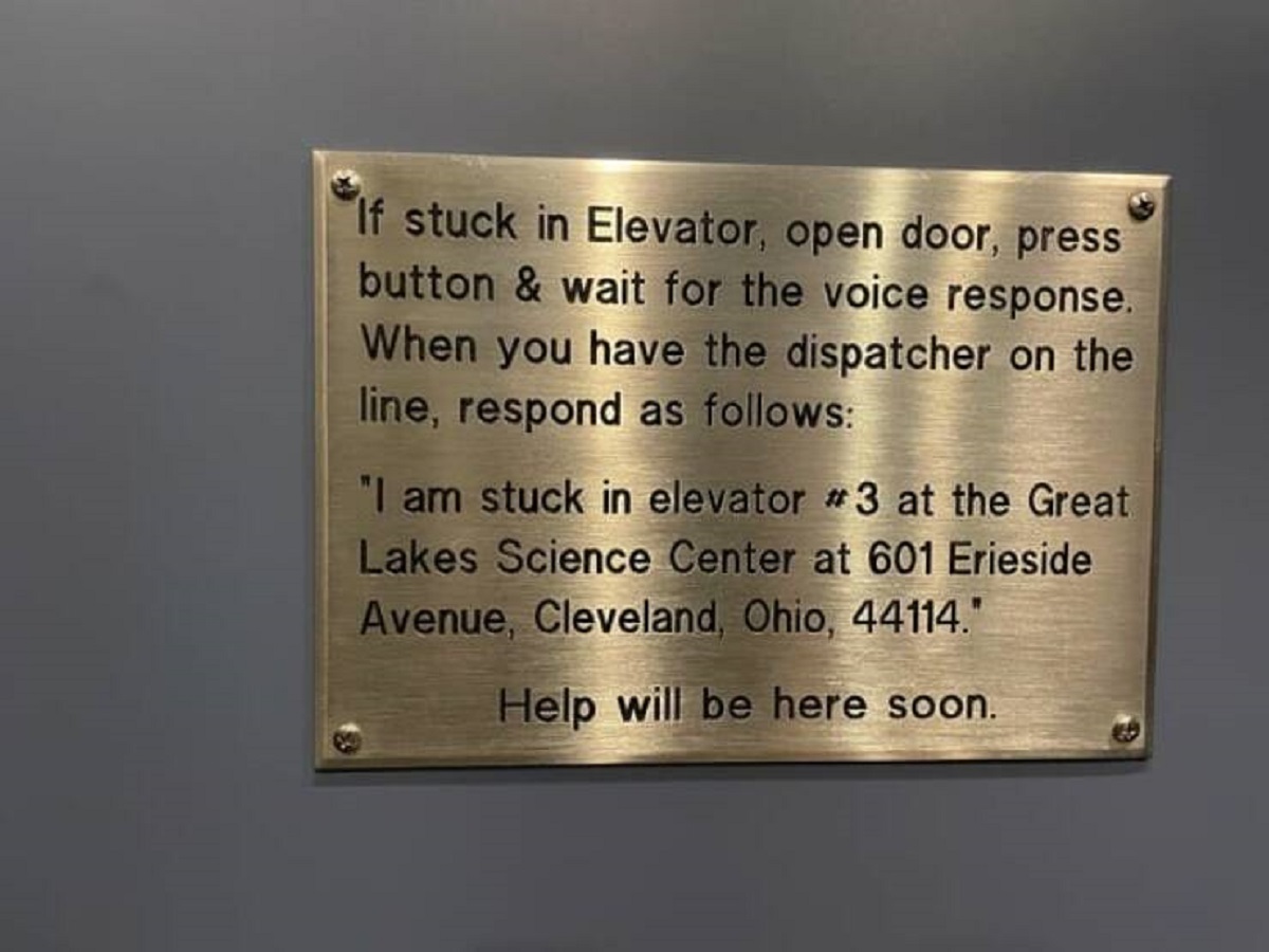 commemorative plaque - If stuck in Elevator, open door, press button & wait for the voice response. When you have the dispatcher on the line, respond as s "I am stuck in elevator at the Great Lakes Science Center at 601 Erieside Avenue, Cleveland, Ohio, 4