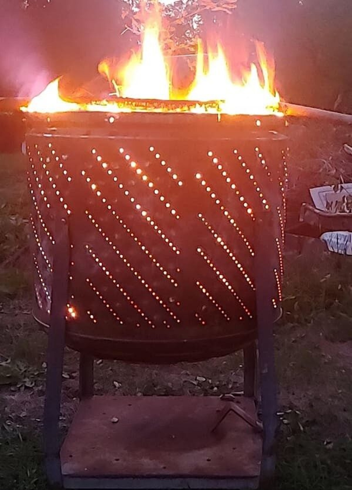 “Turned an old washing machine drum into a fire pit”