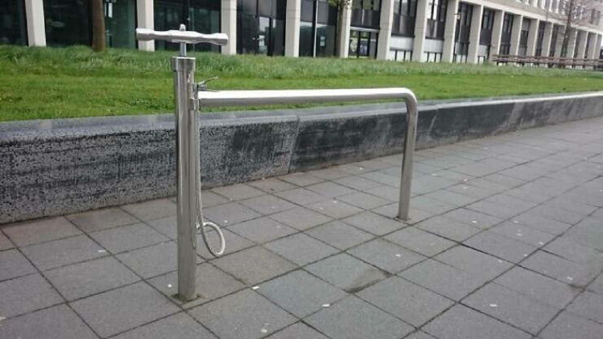 "A Public Bike Stand With A Built-In Pump"

"This cool multi-purpose mechanism was photographed in Utrecht, the Netherlands. And this doesn't come as a surprise. Cycling is a common mode of transport in the Netherlands, with 36% of the people listing the bicycle as their most frequent mode of transport on a typical day."