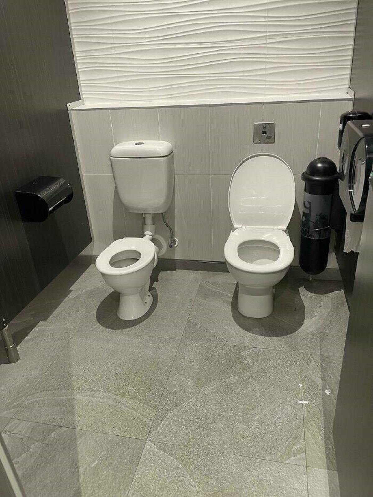 "Adult And Child Sized Toilets In A Single Stall - Auckland International Airport"